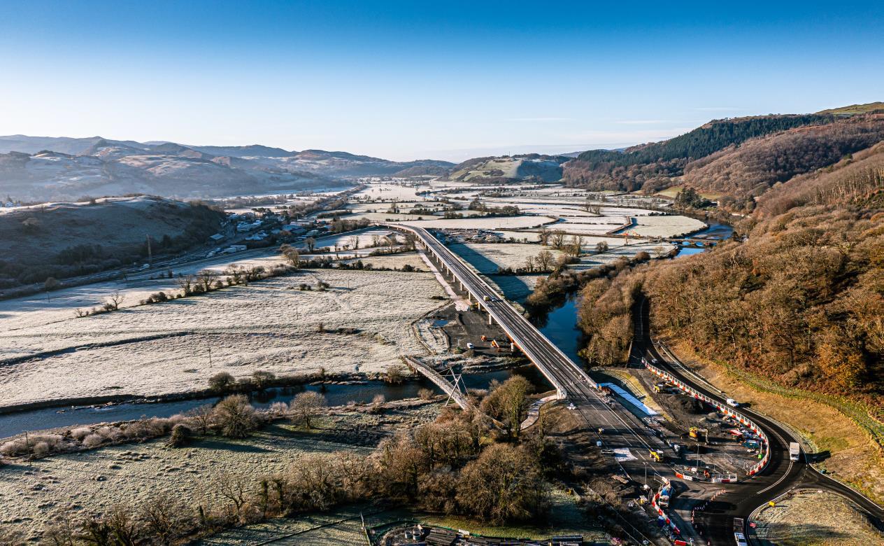 Photograph showing work nearing completion on the Dyfi bridge. Scene is frosty with clear skies.