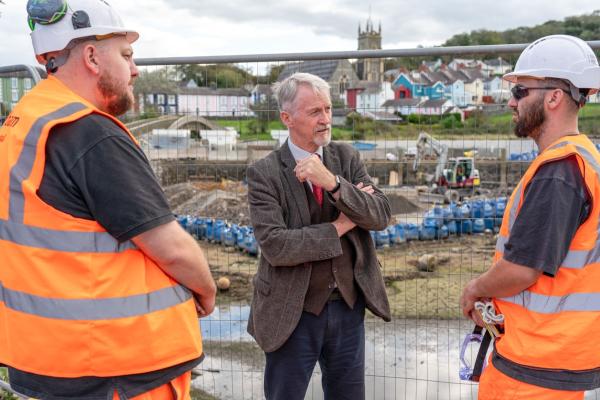 Deputy First Minister with responsibility for Climate Change, Huw Irranca-Davies visiting a £31.5m flood defence scheme in Aberaeron.